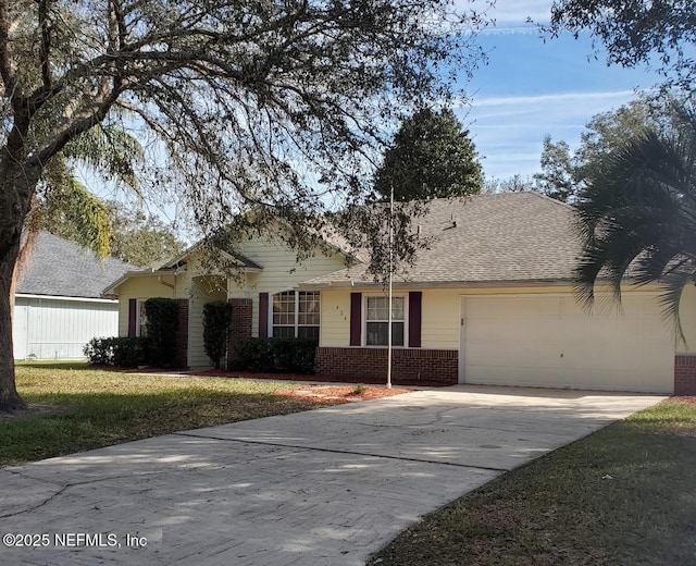 424 Bay Point Way N, Saint Johns, FL 32259 - view of front of home featuring brick siding, a garage, driveway, a shingled roof, and a front yard