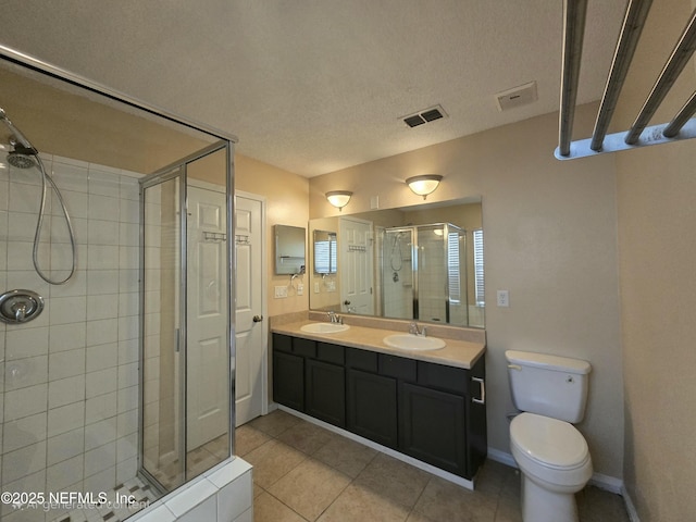 424 Bay Point Way N, Saint Johns, FL 32259 - bathroom with a stall shower, tile patterned floors, double vanity, toilet, and baseboards