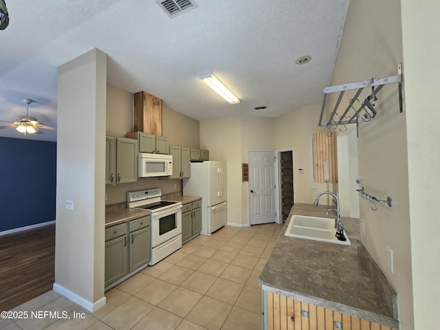 424 Bay Point Way N, Saint Johns, FL 32259 - kitchen with white appliances, a sink, a textured ceiling, ceiling fan, and light tile patterned floors
