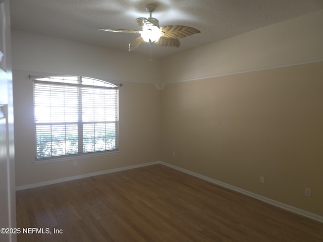 424 Bay Point Way N, Saint Johns, FL 32259 - unfurnished room with wood finished floors, a ceiling fan, baseboards, and a textured ceiling