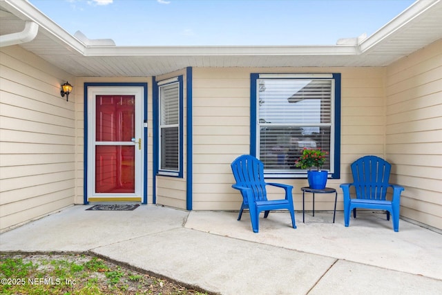 2910 Yule Tree Dr, Edgewater, FL 32141 - doorway to property with covered porch