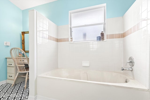 2910 Yule Tree Dr, Edgewater, FL 32141 - bathroom with bathing tub / shower combination and baseboards