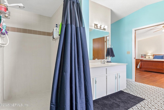 2910 Yule Tree Dr, Edgewater, FL 32141 - bathroom featuring tiled shower and vanity