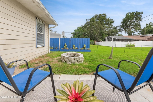 2910 Yule Tree Dr, Edgewater, FL 32141 - view of yard featuring an outdoor fire pit and a patio
