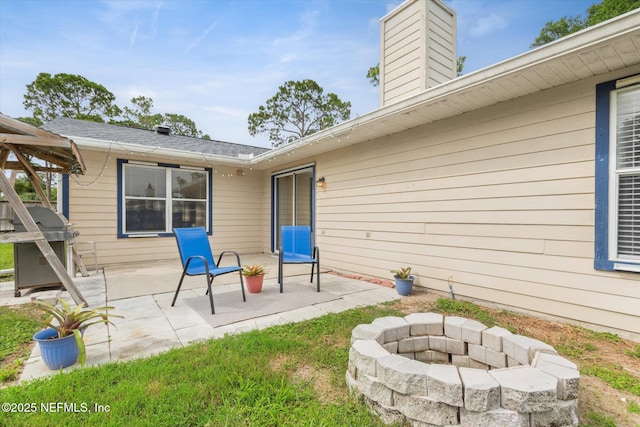 2910 Yule Tree Dr, Edgewater, FL 32141 - view of patio / terrace with an outdoor fire pit and area for grilling