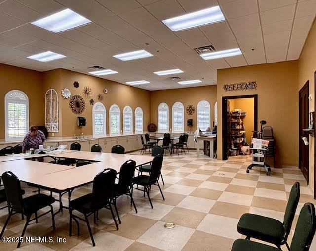 8561 Little Swift Cir Unit 32D, Jacksonville, FL 32256 - dining room with light flooring