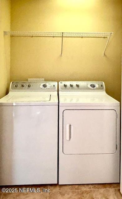 8561 Little Swift Cir Unit 32D, Jacksonville, FL 32256 - laundry area with independent washer and dryer