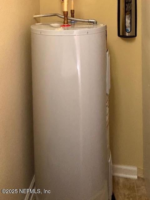 8561 Little Swift Cir Unit 32D, Jacksonville, FL 32256 - utility room with water heater