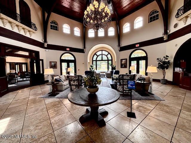 8561 Little Swift Cir Unit 32D, Jacksonville, FL 32256 - building lobby with wooden ceiling and a towering ceiling