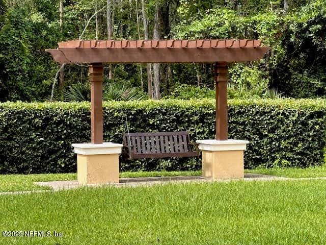 8561 Little Swift Cir Unit 32D, Jacksonville, FL 32256 - community sign featuring a lawn