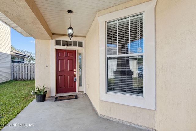 96290 Coral Reef Rd, Yulee, FL 32097 - entrance to property with stucco siding and covered porch