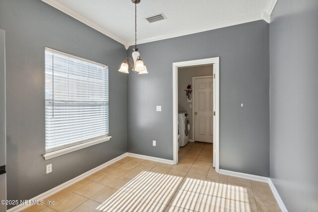 96290 Coral Reef Rd, Yulee, FL 32097 - unfurnished room with crown molding, independent washer and dryer, light tile patterned floors, a chandelier, and baseboards