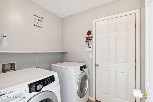 96290 Coral Reef Rd, Yulee, FL 32097 - laundry room featuring washing machine and dryer
