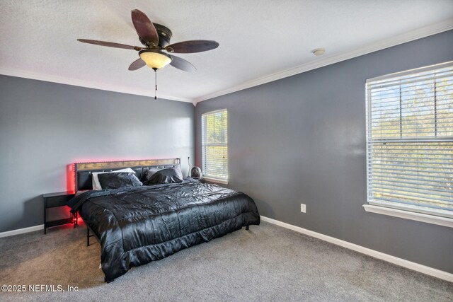 96290 Coral Reef Rd, Yulee, FL 32097 - bedroom featuring ornamental molding, carpet floors, baseboards, and ceiling fan