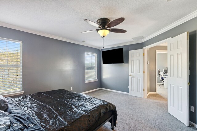 96290 Coral Reef Rd, Yulee, FL 32097 - bedroom featuring carpet flooring, a textured ceiling, crown molding, baseboards, and a ceiling fan