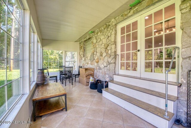 4966 Harvey Grant Rd, Fleming Island, FL 32003 - sunroom with french doors and entry steps