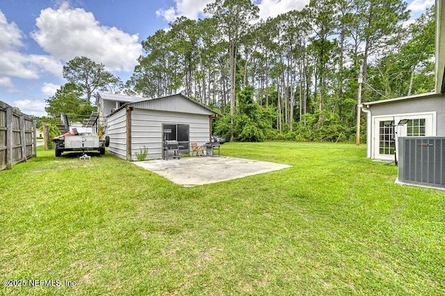 4966 Harvey Grant Rd, Fleming Island, FL 32003 - view of green lawn with cooling unit and a patio area