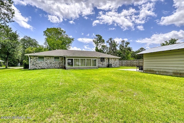 4966 Harvey Grant Rd, Fleming Island, FL 32003 - rear view of house featuring stone siding