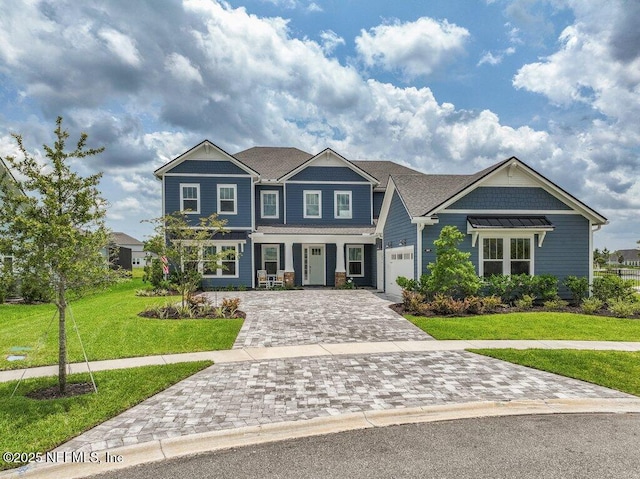 105 Awlleaf Ct, Saint Augustine, FL 32095 - craftsman inspired home with decorative driveway and a front yard
