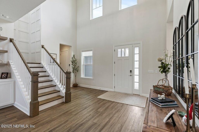 105 Awlleaf Ct, Saint Augustine, FL 32095 - entryway with wood finished floors, stairs, and a high ceiling
