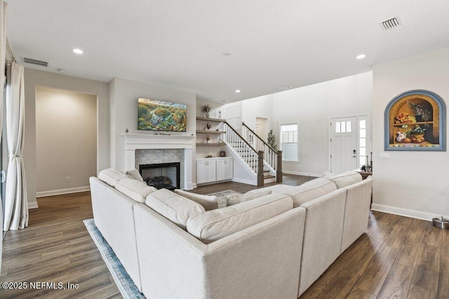 105 Awlleaf Ct, Saint Augustine, FL 32095 - living area featuring dark wood-style floors, recessed lighting, a fireplace, and stairway