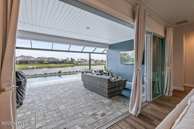 105 Awlleaf Ct, Saint Augustine, FL 32095 - view of patio / terrace featuring a water view, glass enclosure, and an outdoor pool