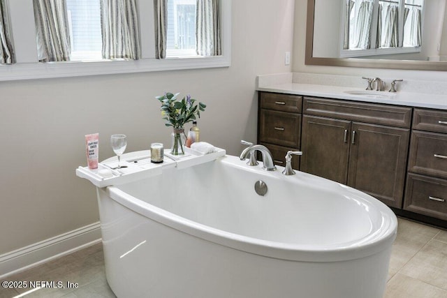 105 Awlleaf Ct, Saint Augustine, FL 32095 - bathroom with a freestanding tub and vanity