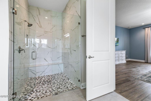 105 Awlleaf Ct, Saint Augustine, FL 32095 - bathroom with a marble finish shower and wood finished floors