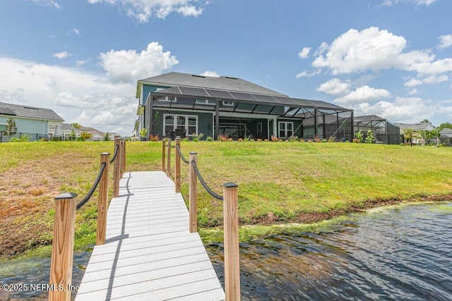 105 Awlleaf Ct, Saint Augustine, FL 32095 - rear view of property with glass enclosure, a yard, and a water view