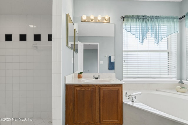 1608 Rustling Dr, Fleming Island, FL 32003 - full bathroom featuring a garden tub, vanity, and tiled shower