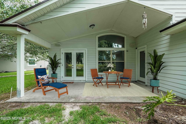 1608 Rustling Dr, Fleming Island, FL 32003 - view of patio featuring french doors