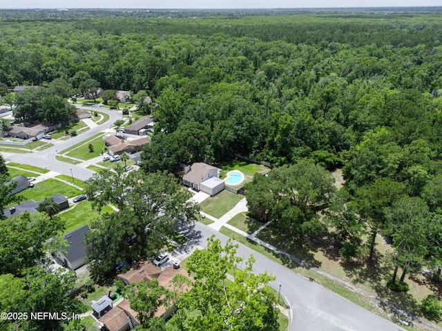 8687 Bishopswood Dr, Jacksonville, FL 32244 - aerial view of property and surrounding area with a forest