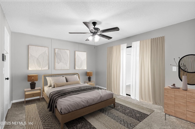 8687 Bishopswood Dr, Jacksonville, FL 32244 - carpeted bedroom featuring a textured ceiling and a ceiling fan