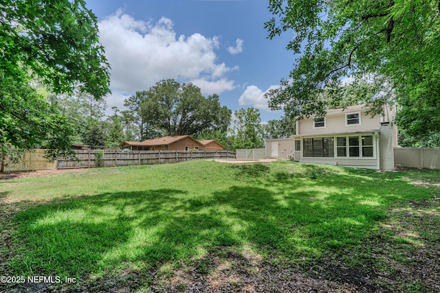 8687 Bishopswood Dr, Jacksonville, FL 32244 - fenced backyard with a sunroom