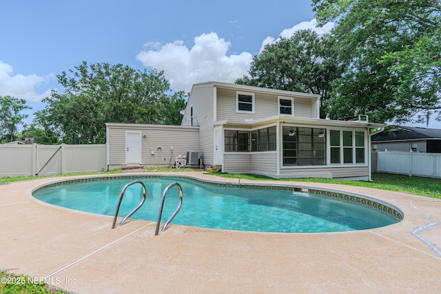 8687 Bishopswood Dr, Jacksonville, FL 32244 - view of pool featuring a sunroom, a fenced backyard, and a patio
