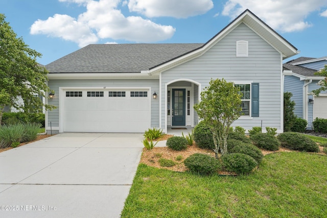 68 Briar Ridge Ct, Ponte Vedra, FL 32081 - traditional-style home with a garage, driveway, roof with shingles, and a front lawn