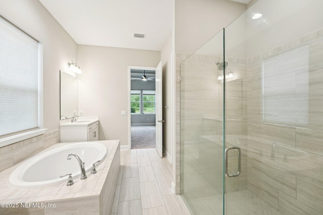 68 Briar Ridge Ct, Ponte Vedra, FL 32081 - bathroom featuring vanity, a garden tub, ceiling fan, and a shower stall