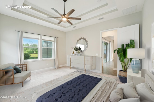 68 Briar Ridge Ct, Ponte Vedra, FL 32081 - bedroom with a raised ceiling, multiple windows, and carpet floors