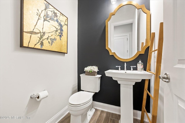 37 Permit Ct, Saint Augustine, FL 32092 - bathroom featuring wood finished floors and toilet