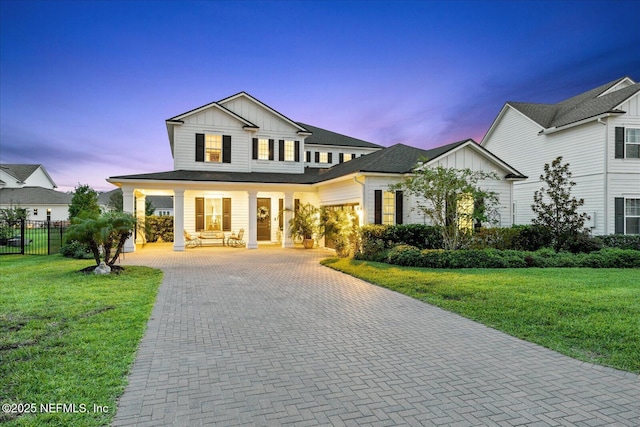 37 Permit Ct, Saint Augustine, FL 32092 - view of front facade with board and batten siding, decorative driveway, and a porch