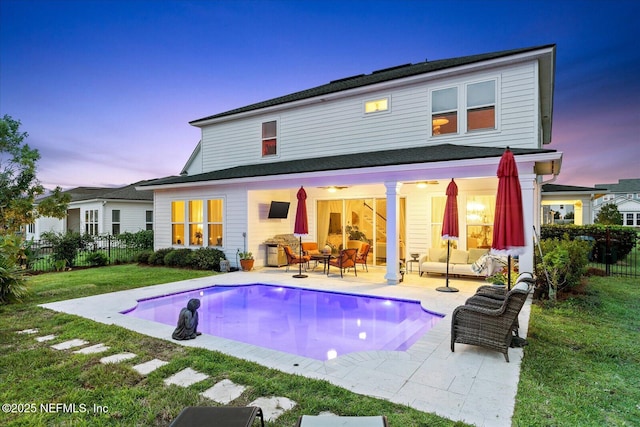 37 Permit Ct, Saint Augustine, FL 32092 - rear view of property featuring an outdoor hangout area, a patio area, a fenced backyard, and an outdoor pool