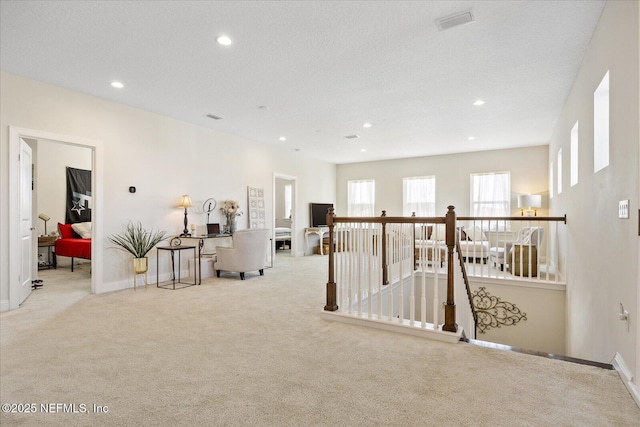 37 Permit Ct, Saint Augustine, FL 32092 - hall with carpet floors, an upstairs landing, and recessed lighting