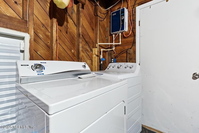 433 W 70th St, Jacksonville, FL 32208 - laundry area featuring separate washer and dryer and wooden walls