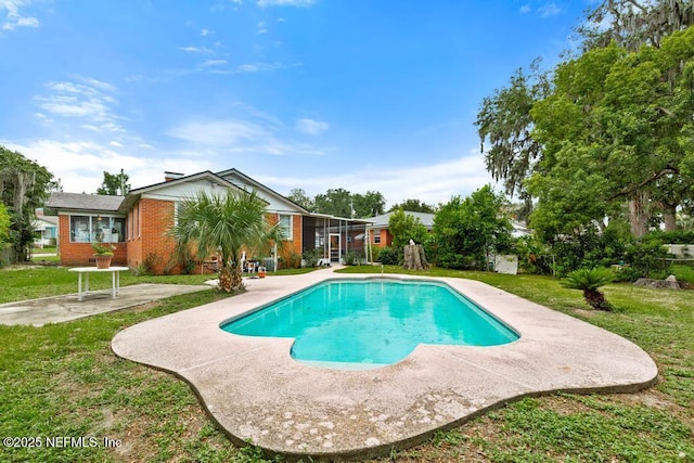 433 W 70th St, Jacksonville, FL 32208 - swimming pool featuring a patio area and a yard