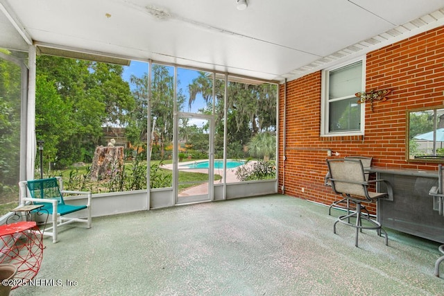 433 W 70th St, Jacksonville, FL 32208 - unfurnished sunroom with plenty of natural light