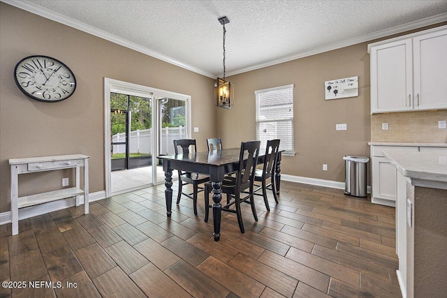 795 Shetland Dr, Saint Johns, FL 32259 - dining space with ornamental molding, dark wood finished floors, and a textured ceiling