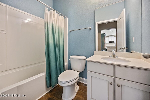 795 Shetland Dr, Saint Johns, FL 32259 - bathroom with vanity, shower / bath combo with shower curtain, wood finished floors, and a textured wall