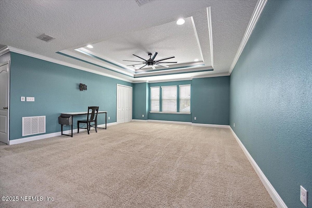 795 Shetland Dr, Saint Johns, FL 32259 - carpeted spare room with a textured ceiling, a raised ceiling, ceiling fan, ornamental molding, and a textured wall