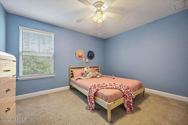 795 Shetland Dr, Saint Johns, FL 32259 - carpeted bedroom with a ceiling fan and a textured ceiling
