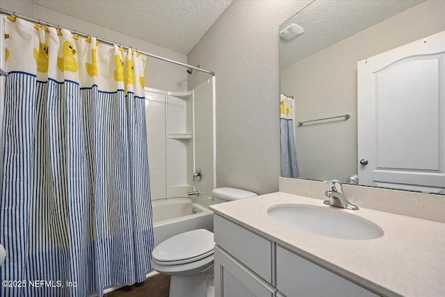 795 Shetland Dr, Saint Johns, FL 32259 - bathroom featuring a textured ceiling, wood finished floors, vanity, shower / bath combination with curtain, and a textured wall